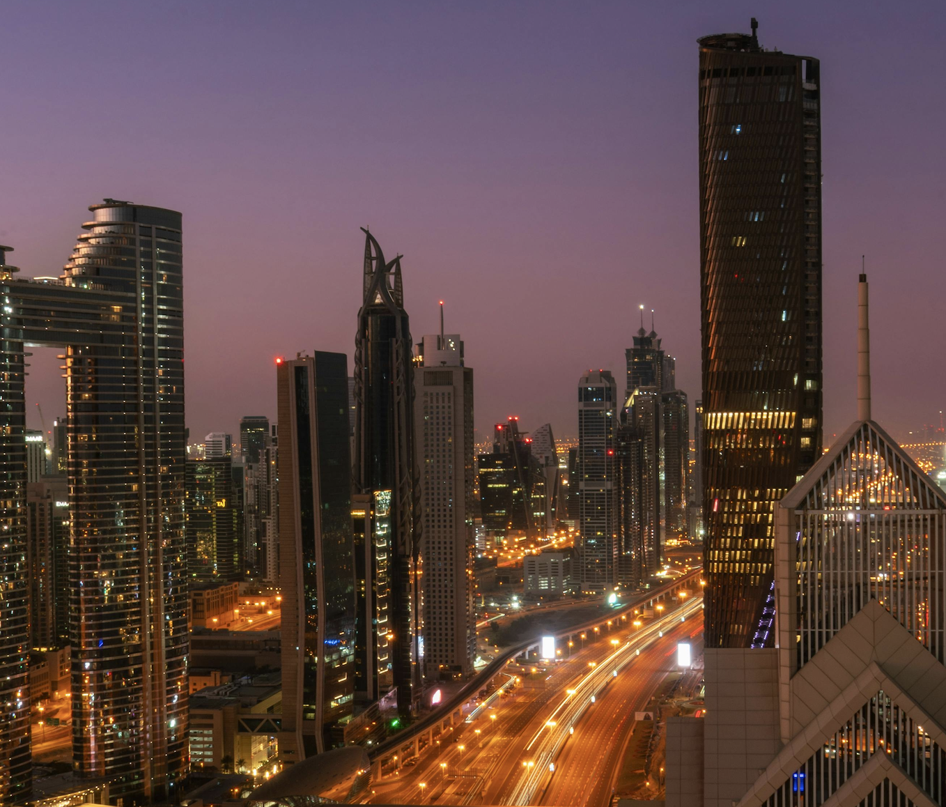 Dubai skyline at night with Sheikh Zayed Road